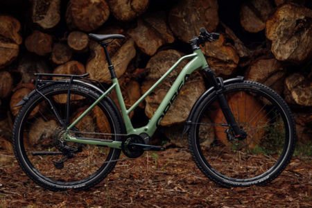 A dark green electric bike