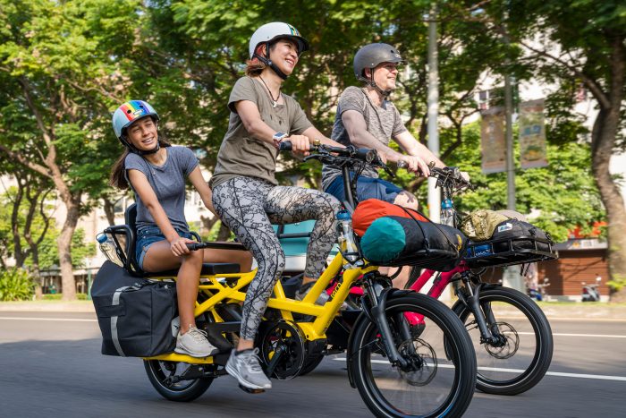 A family enjoying Tern cargo bikes.